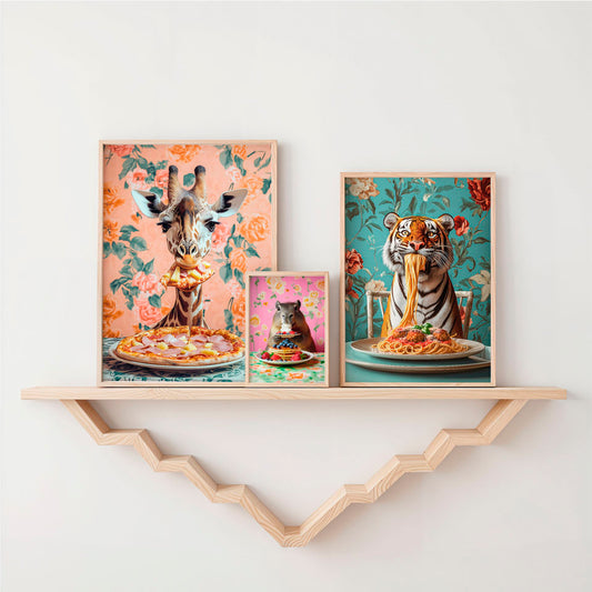 a shelf with two pictures of cats and a giraffe