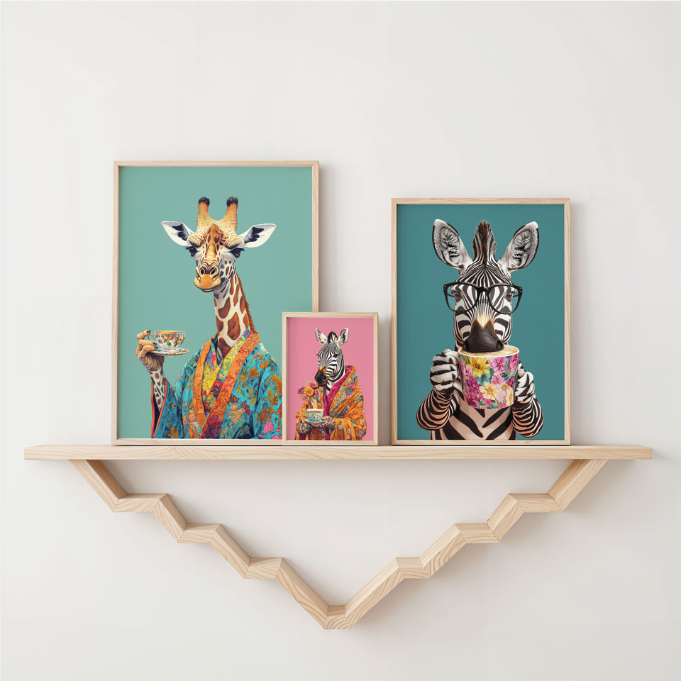 a couple of pictures of giraffes on a shelf
