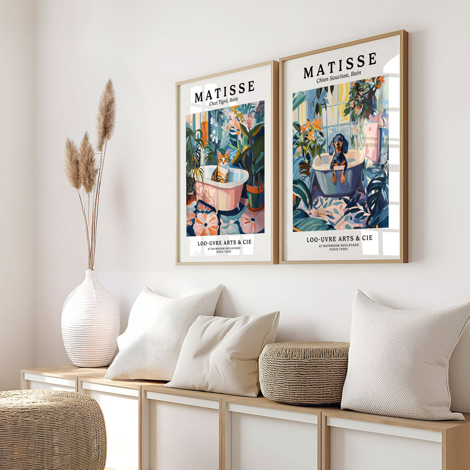 a couple of pictures hanging on the side of a wall