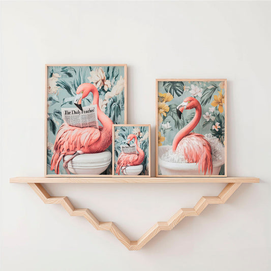 two flamingos are sitting on a shelf next to each other