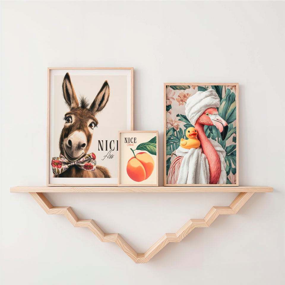 a couple of pictures on a shelf above a shelf