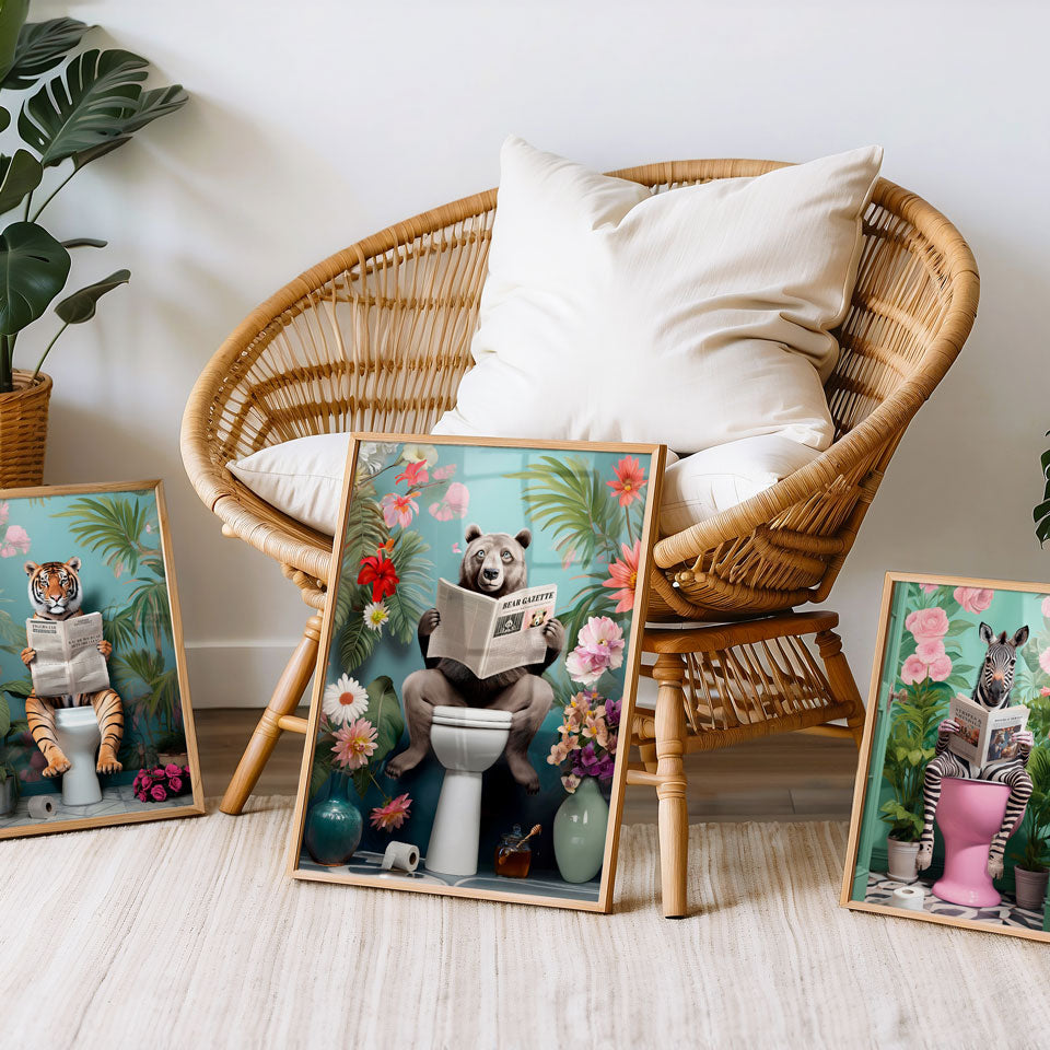 a wicker chair sitting next to three framed pictures