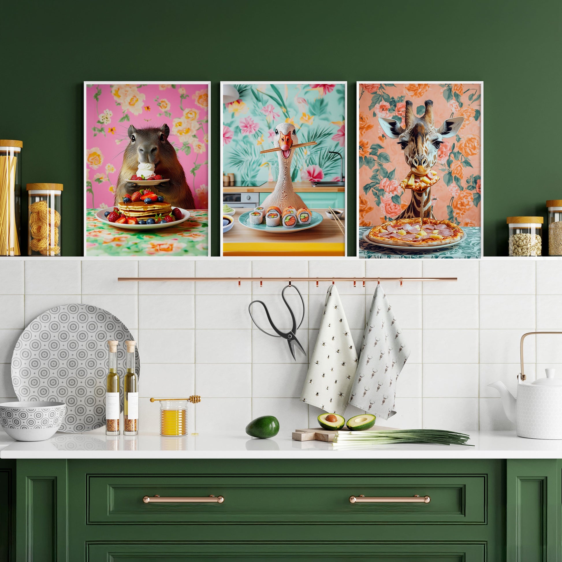 a kitchen with green cabinets and artwork on the wall