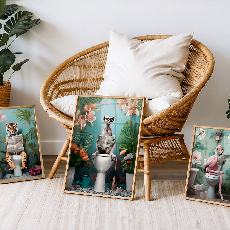 a wicker chair sitting next to three pictures of cats